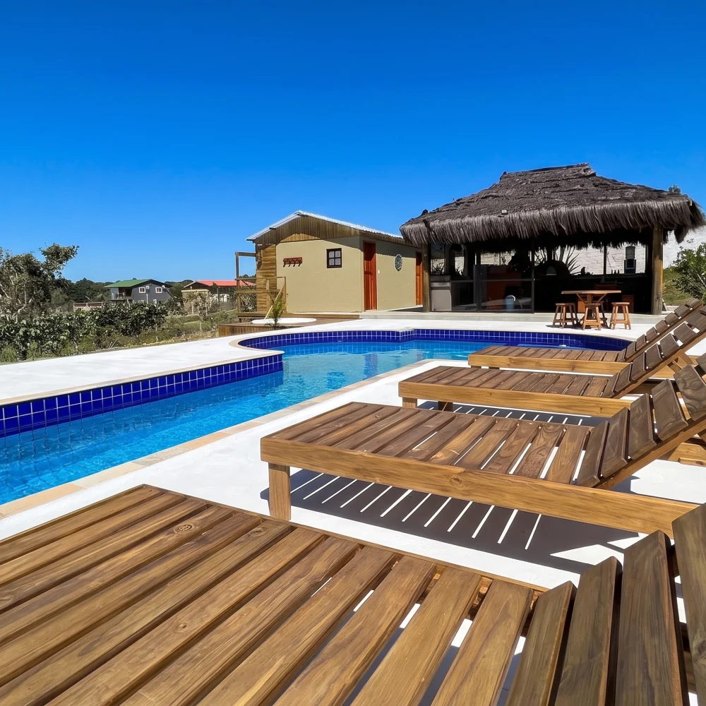 Wooden_loungers_by_swimming_pool_202608051307